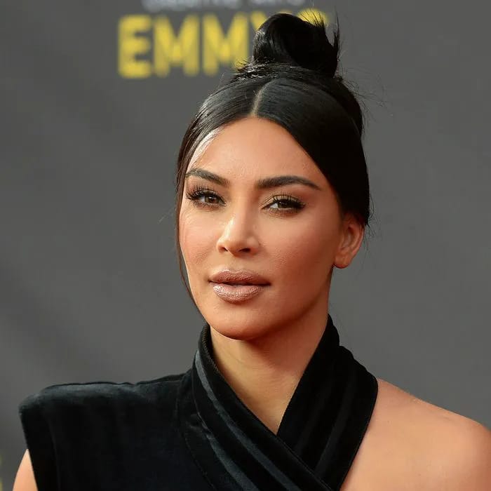 Kim Kardashian at 2019 Emmy Awards showcasing her stunning blue bikini.