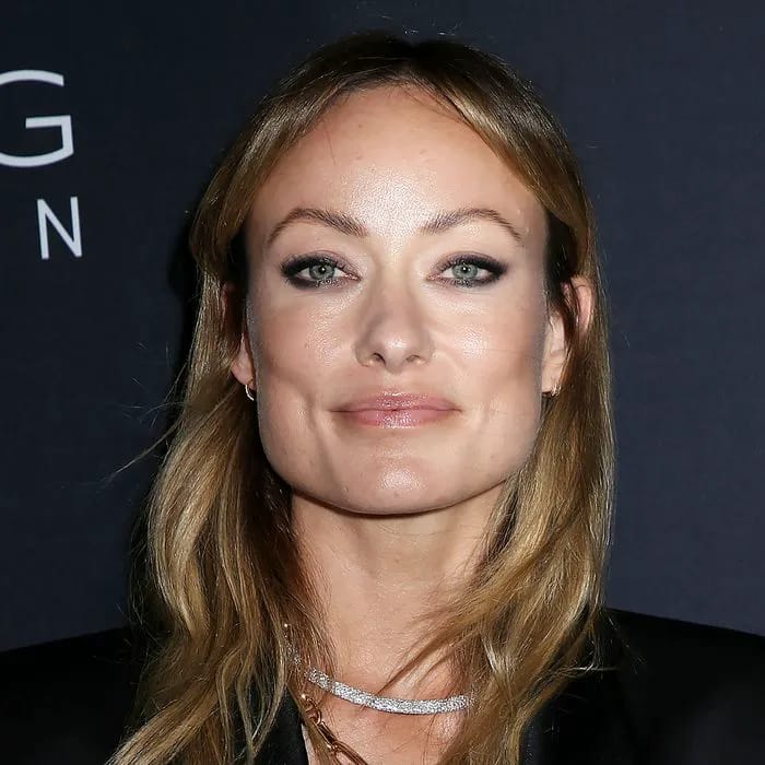 Olivia Wilde with a smokey eye and diamond necklace