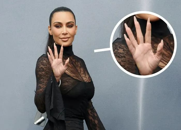 Kim Kardashian wrinkled hand Balenciaga FW24 show Paris