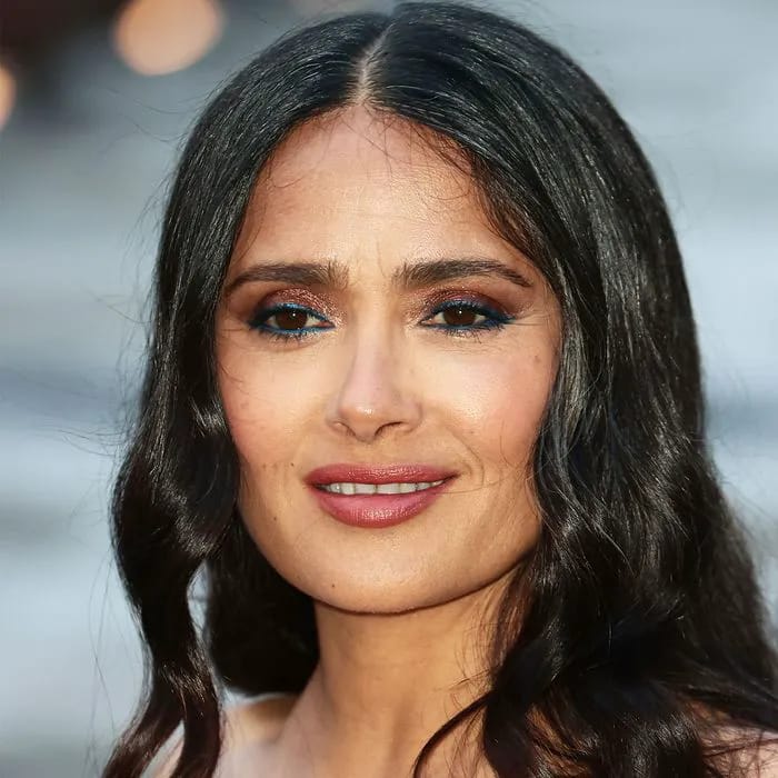 "Salma Hayek in a low-cut strapless sequin gown at the Giorgio Cini Foundation in Venice"