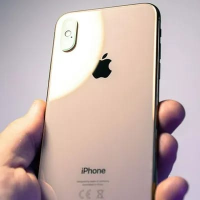 holding-pink-iphone-up