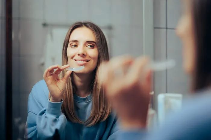 Smiling woman showing off her bright white teeth