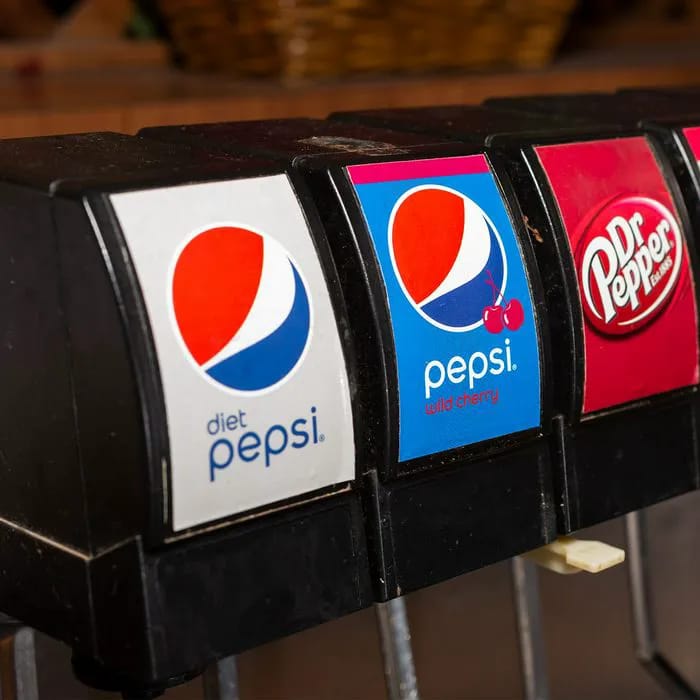 Pepsi soda fountain dispensing sugary beverage