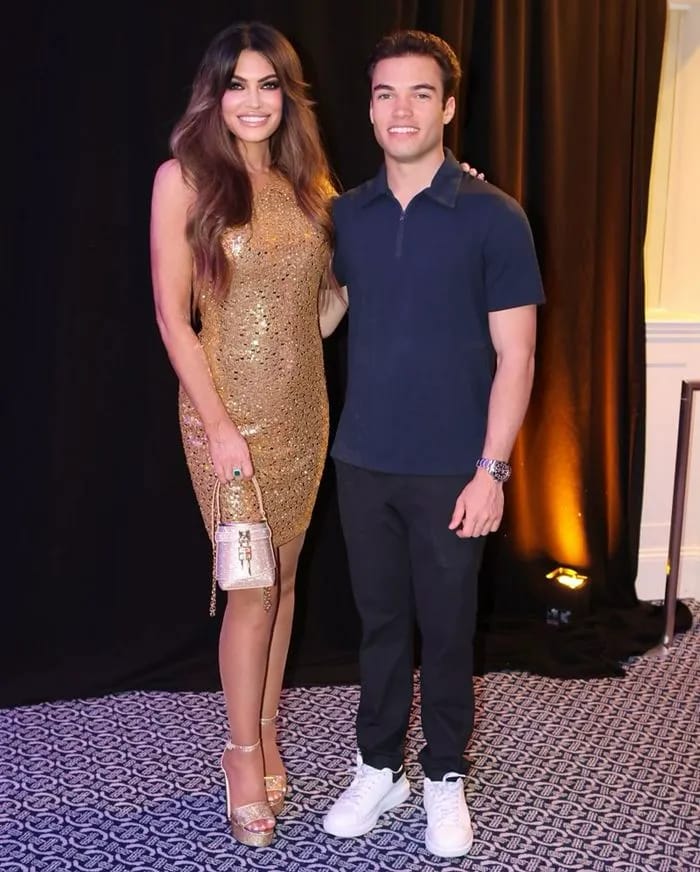 Kimberly-Guilfoyle-wears-a-Gold-Mini-Dress-in-Birthday-Post-with-son-Ronan
