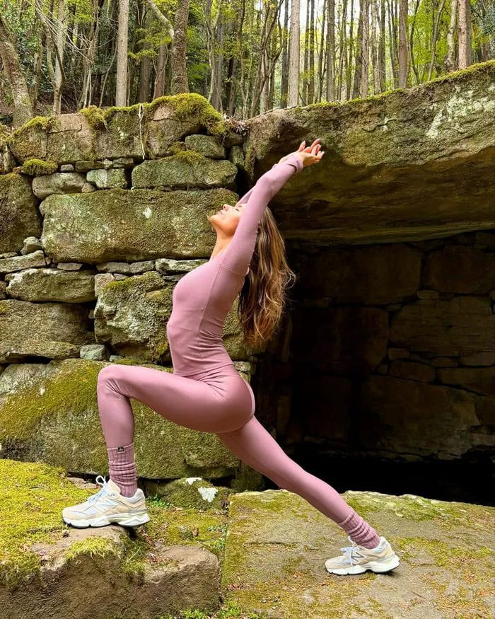 Alessandra Ambrosio poses in purple Alo Yoga set on Instagram