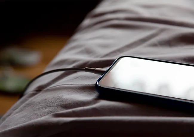phone-charging-on-bed