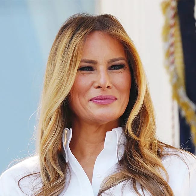 Melania Trump speaking to military personnel at a picnic