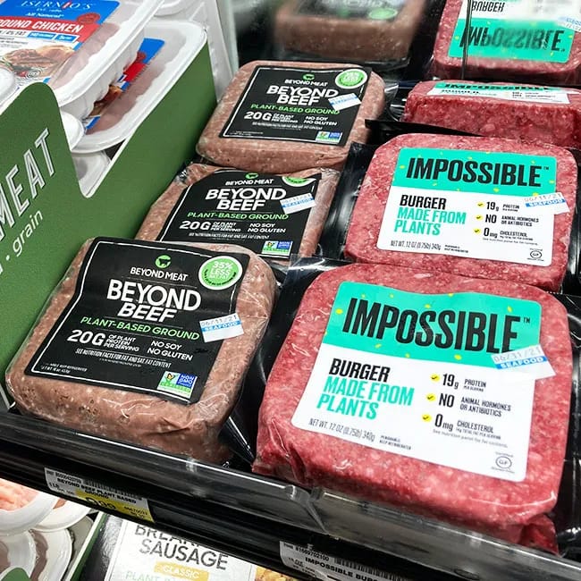 Beyond Beef and Impossible meat packages on display.