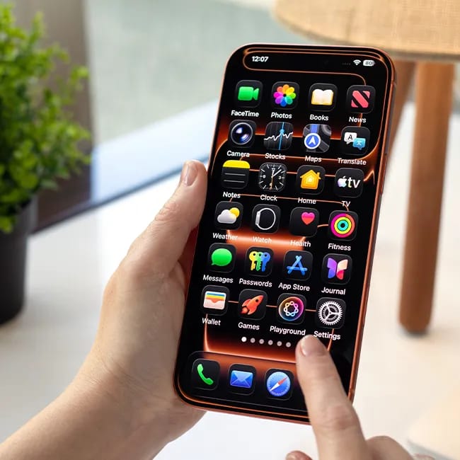 Woman holding iPhone 17 Pro, capturing a moment.