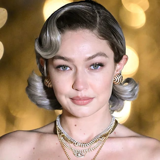 Gigi Hadid at Le Grand Diner du Louvre photocall event.