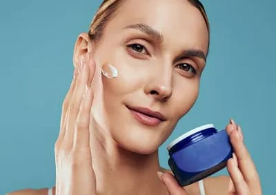 woman-moisturizing-skin