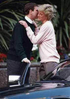 Princess Diana and Andrew hugging