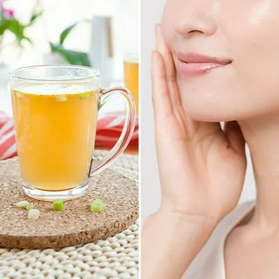 Bone broth in a cup beside a woman with firm skin.