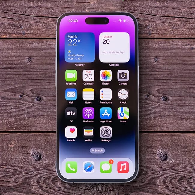 iPhone 14 displaying multiple applications on screen.