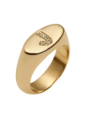 Elongated oval signet ring with white diamond letters by Jennifer Fisher.