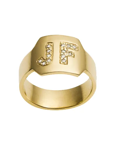 Large ID ring with burnished white diamond letters by Jennifer Fisher.