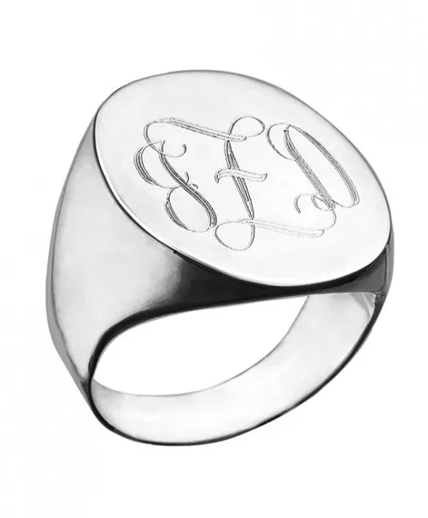 Engraved swirly initial oval signet ring by Jennifer Zeuner.