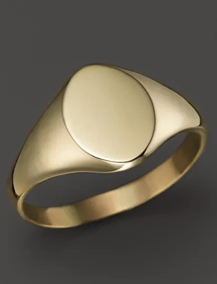 Zoe Chicco's single stamped gold signet ring