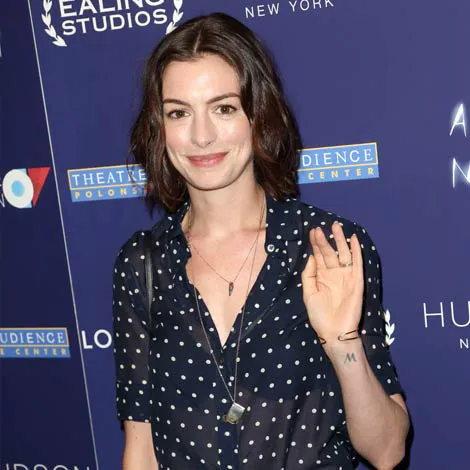 Anne Hathaway's stunning ring with a unique shape.