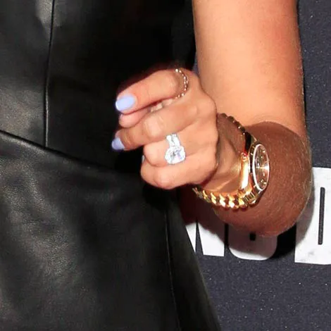 Ashley Tisdale showcasing a chic and modern ring design.