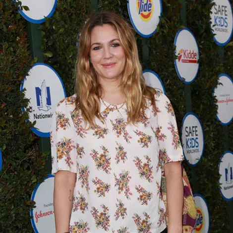 Drew Barrymore's unique ring with intricate design details.