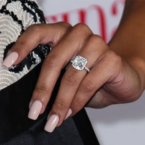 Naya Rivera showcasing a chic and modern ring.