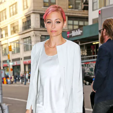 Nicole Richie's unique ring with artistic design elements.