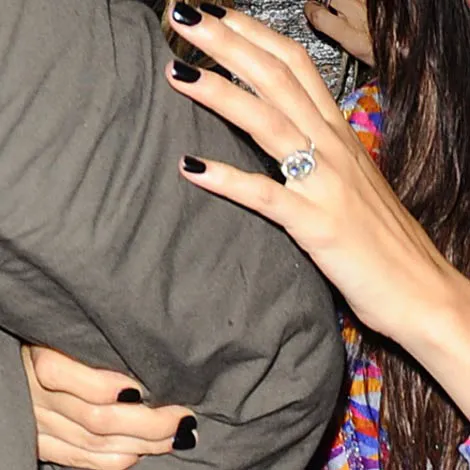 Nicole Richie flaunting a bohemian-style gemstone ring.
