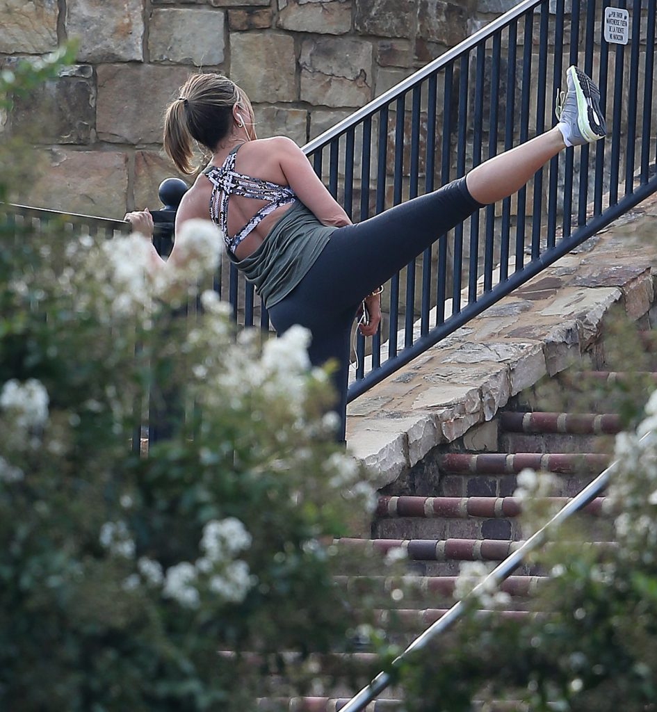 Jennifer Aniston on set of Mother's Day filming a running scene in the park in Georgia.