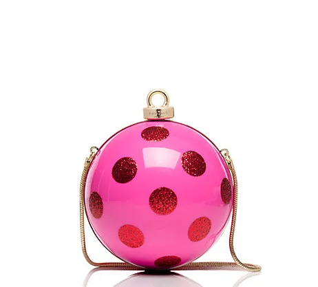Stylish dot ornament clutch for festive celebrations.