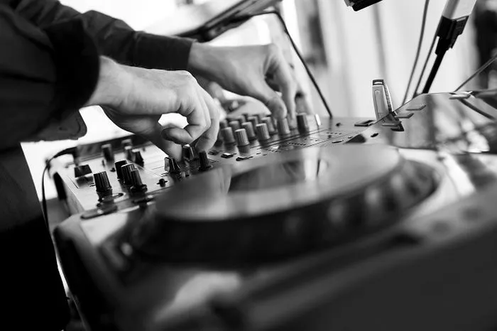 DJ playing music at a lively wedding reception