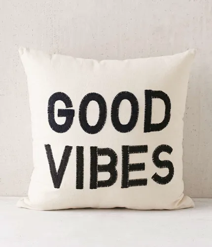 Magical thinking good vibes pillow for cozy spaces.