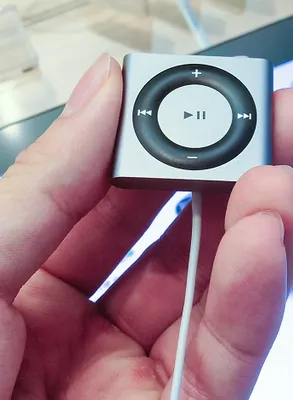 Sleek iPod showcasing modern technology and music enjoyment.