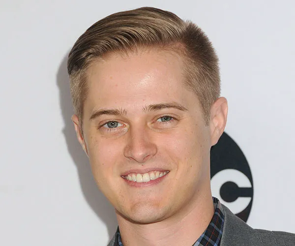 Lucas now: Current photo of Lucas Grabeel illustrating his style evolution.