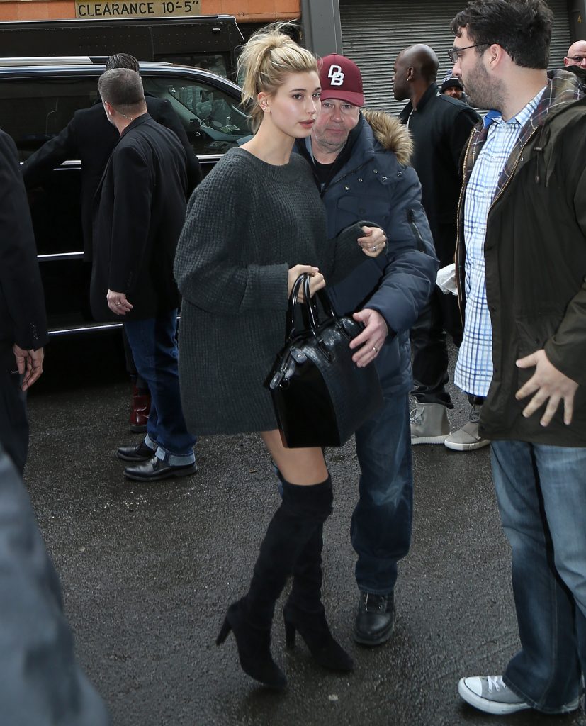 Hailey Baldwin arrives in Justin Bieber's car to Kayne West fashion show in New York City. Pictured: hailey baldwin Ref: SPL948383 120215 Picture by: Ryan Turgeon / Splash News Splash News and Pictures Los Angeles: 310-821-2666 New York: 212-619-2666 London: 870-934-2666 photodesk@splashnews.com 