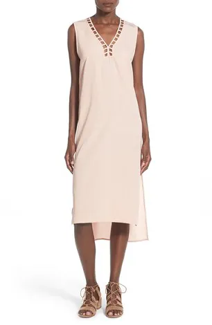 Glamorous celebrity red carpet appearance showcasing a sleek dress