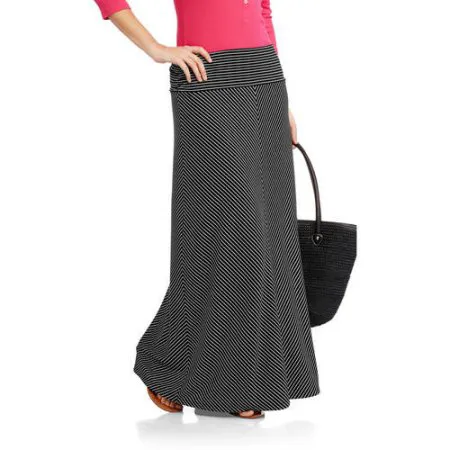 Faded Glory Women's Fashion Maxi Skirt with Shirred Waistband Trendy lifestyle product arrangement on a rustic table.