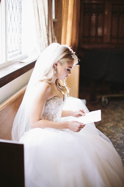 Bride reading letter from the groom