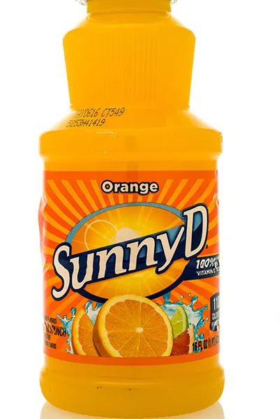 Sunny D or any artificial fruit juices Close-up of Kim Kardashian's trendy outfit details