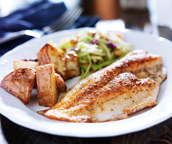 The Worst Fish That’s Slowing Your Weight Loss, According To Studies