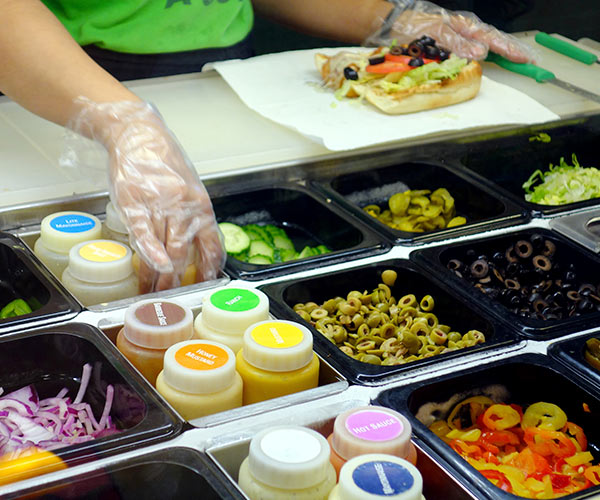 behind subway counter