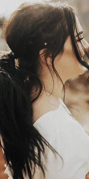 Ponytail with loose curls