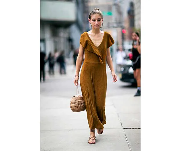 Colorful straw bag showcasing contemporary fashion trends.