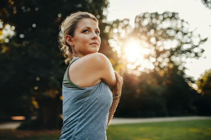 Energetic person exercising outdoors during the weekend