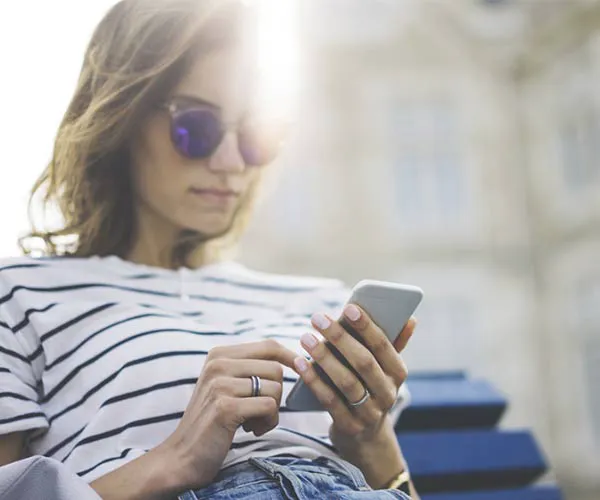 woman on iPhone