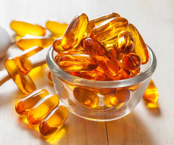 supplements in small glass bowl