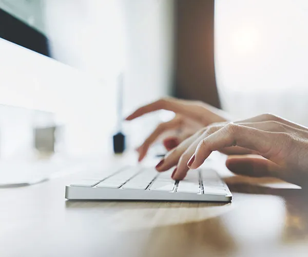 How Your Name Change Affects Your Job woman typing