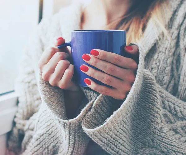 woman drinking coffee