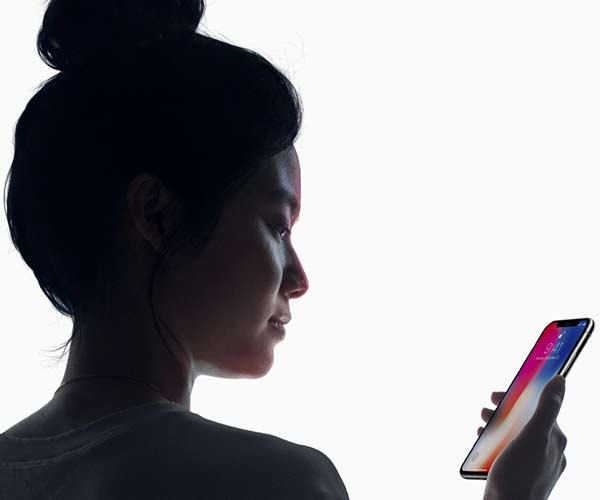 woman with iPhone X