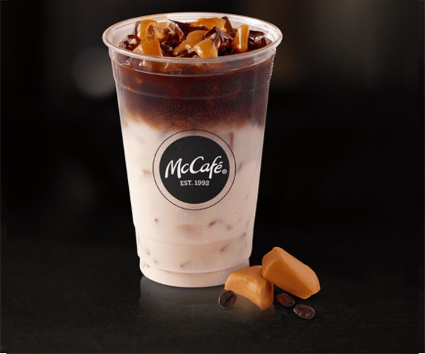 McCafé Brewed Iced Coffees are available with Caramel, Hazelnut, French Van...